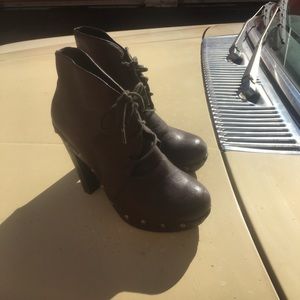 Brown high heel booties.